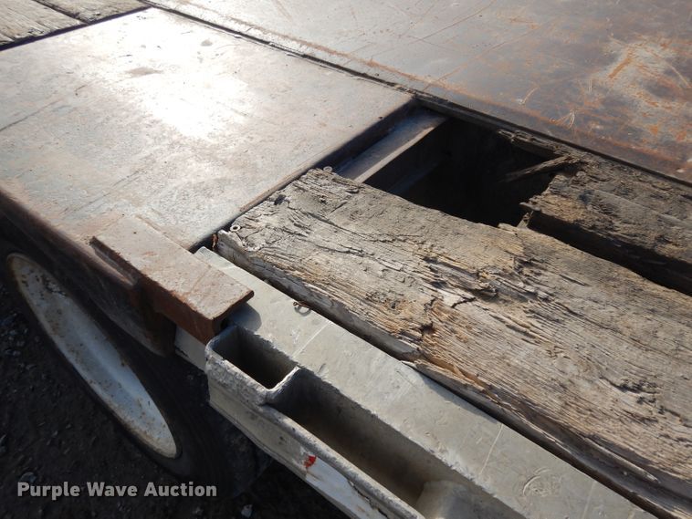 image for item GJ9159 1999 Transcraft drop deck equipment trailer