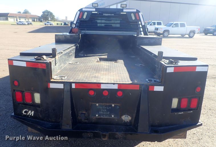 image for item DC3426 2011 Dodge Ram 3500 Crew Cab flatbed pickup truck