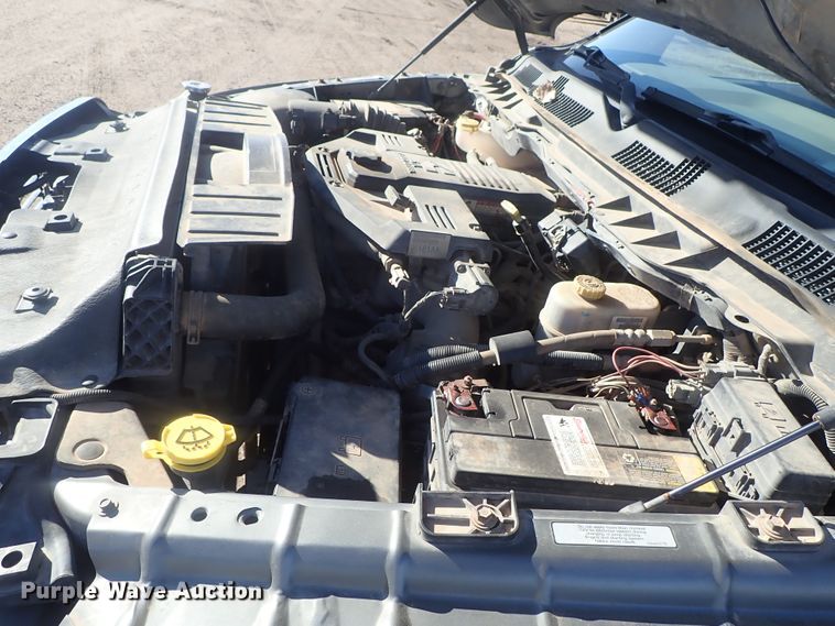 image for item DC3426 2011 Dodge Ram 3500 Crew Cab flatbed pickup truck