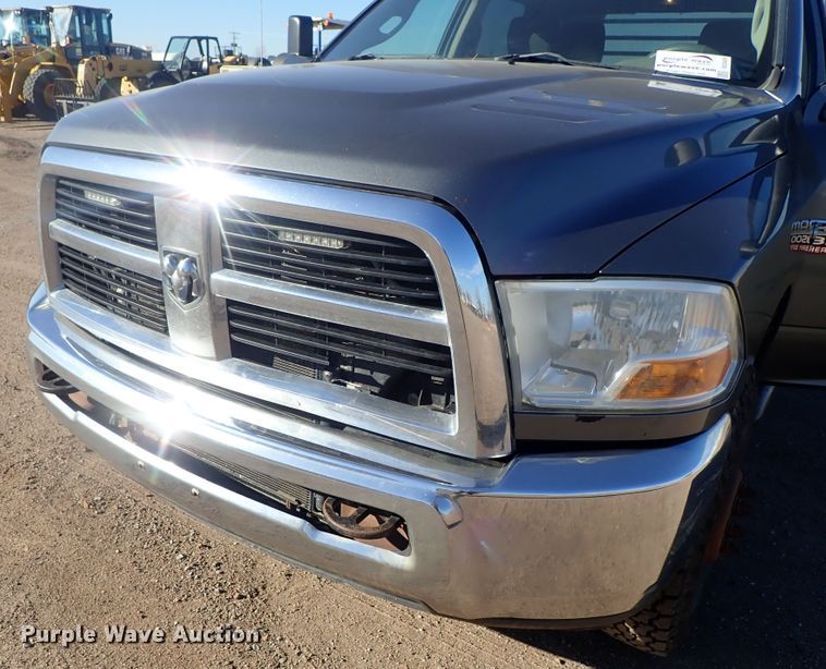 image for item DC3426 2011 Dodge Ram 3500 Crew Cab flatbed pickup truck