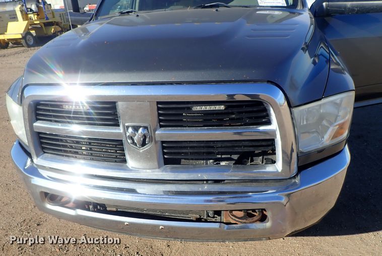 image for item DC3426 2011 Dodge Ram 3500 Crew Cab flatbed pickup truck