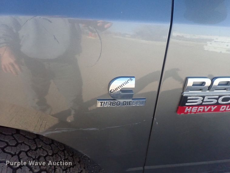 image for item DC3426 2011 Dodge Ram 3500 Crew Cab flatbed pickup truck