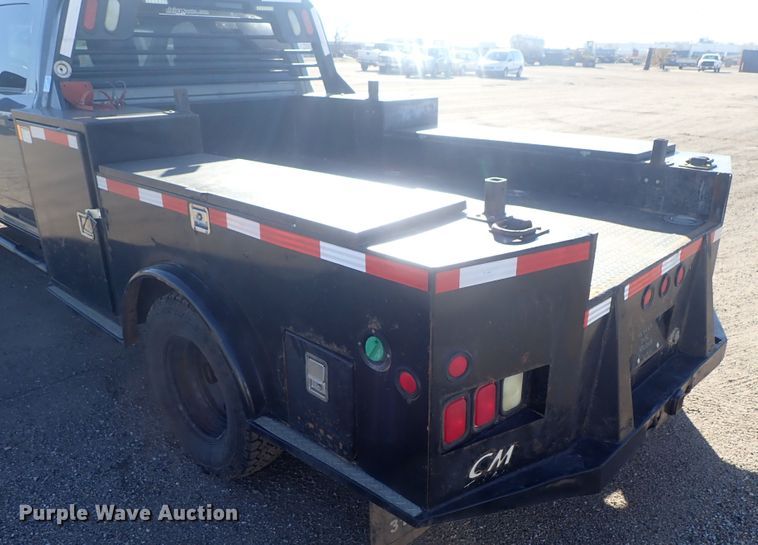 image for item DC3426 2011 Dodge Ram 3500 Crew Cab flatbed pickup truck