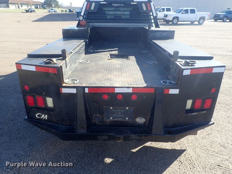 image for item DC3426 2011 Dodge Ram 3500 Crew Cab flatbed pickup truck