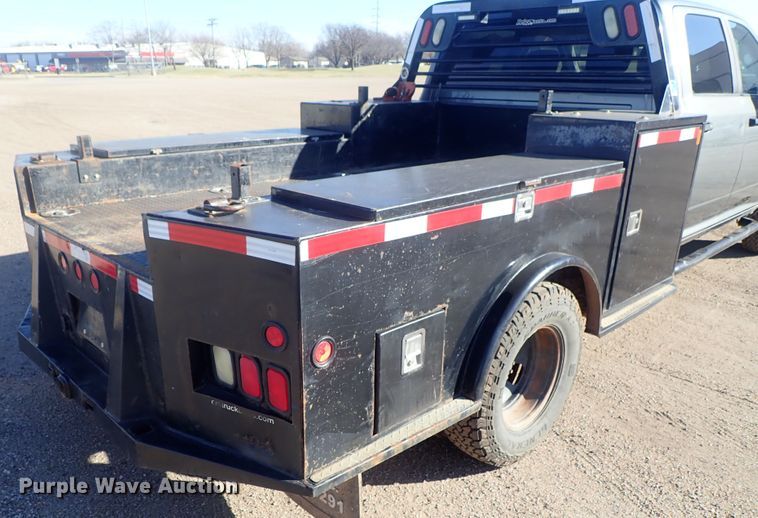image for item DC3426 2011 Dodge Ram 3500 Crew Cab flatbed pickup truck