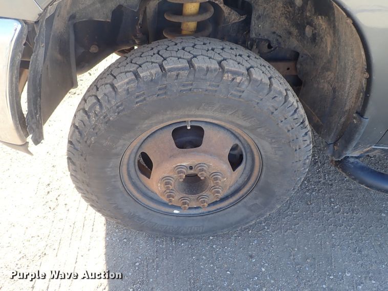 image for item DC3426 2011 Dodge Ram 3500 Crew Cab flatbed pickup truck