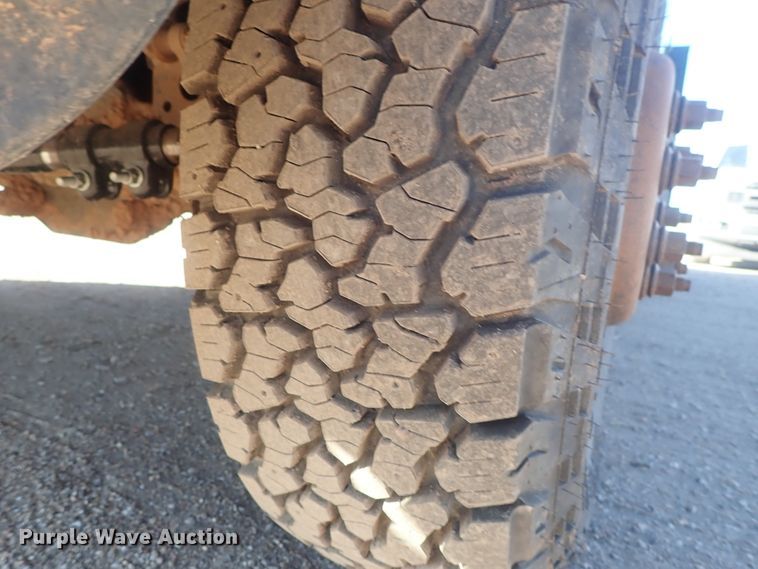 image for item DC3426 2011 Dodge Ram 3500 Crew Cab flatbed pickup truck