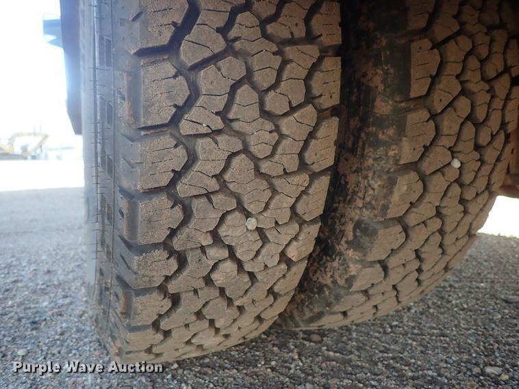 image for item DC3426 2011 Dodge Ram 3500 Crew Cab flatbed pickup truck