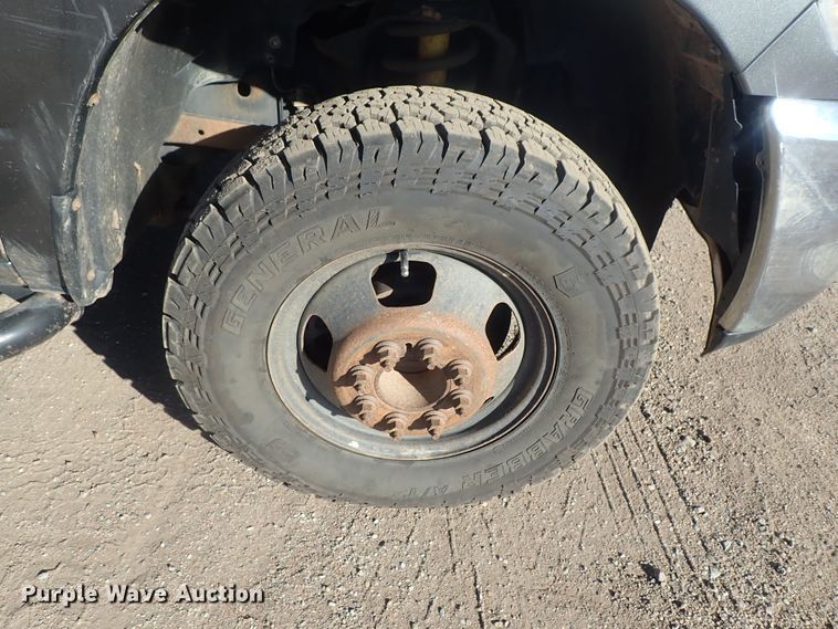 image for item DC3426 2011 Dodge Ram 3500 Crew Cab flatbed pickup truck