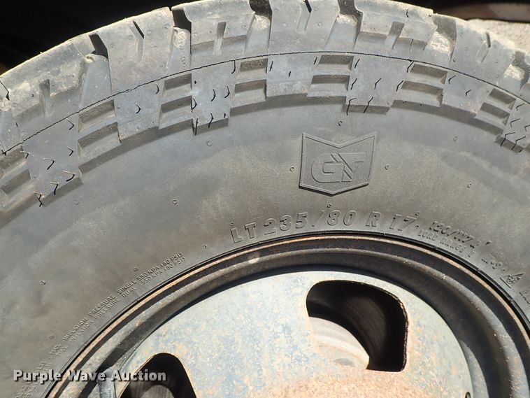 image for item DC3426 2011 Dodge Ram 3500 Crew Cab flatbed pickup truck