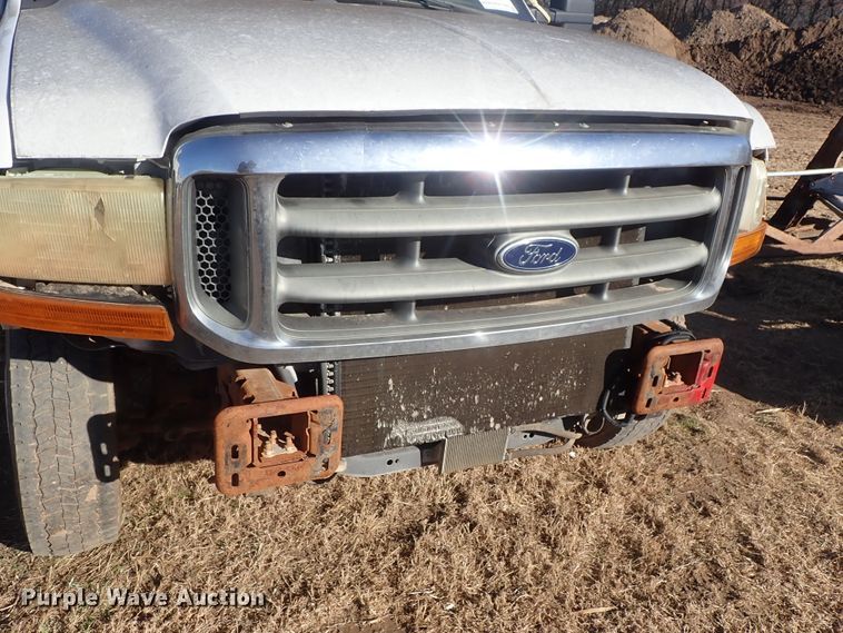 image for item DC3437 1999 Ford F450 Super Duty flatbed truck