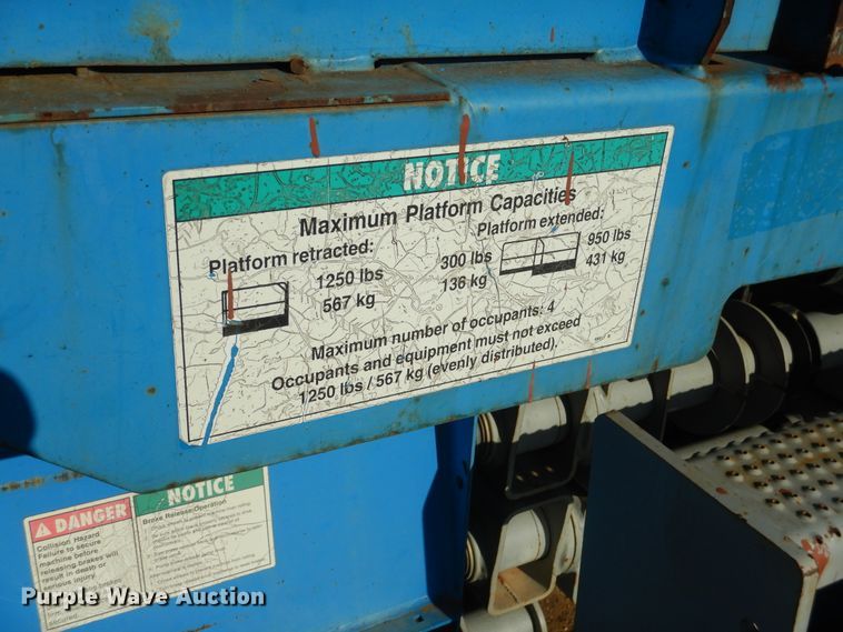 image for item DE4077 2002 Genie GS-2668RT scissor lift