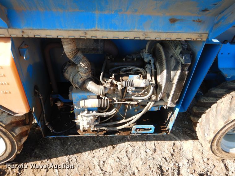 image for item DE4077 2002 Genie GS-2668RT scissor lift