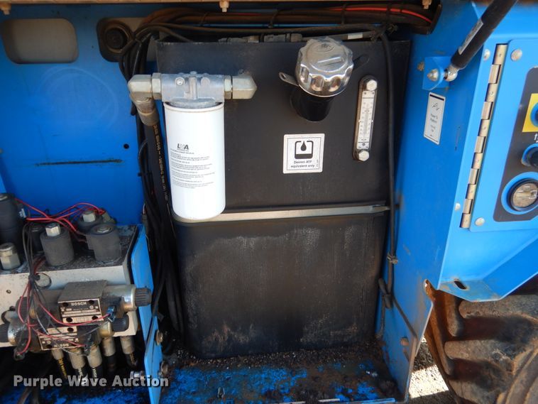 image for item DE4077 2002 Genie GS-2668RT scissor lift