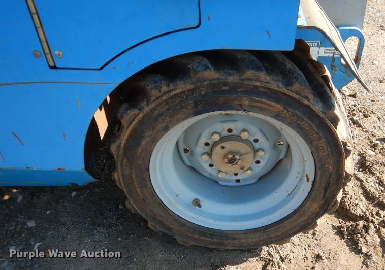 image for item DE4077 2002 Genie GS-2668RT scissor lift