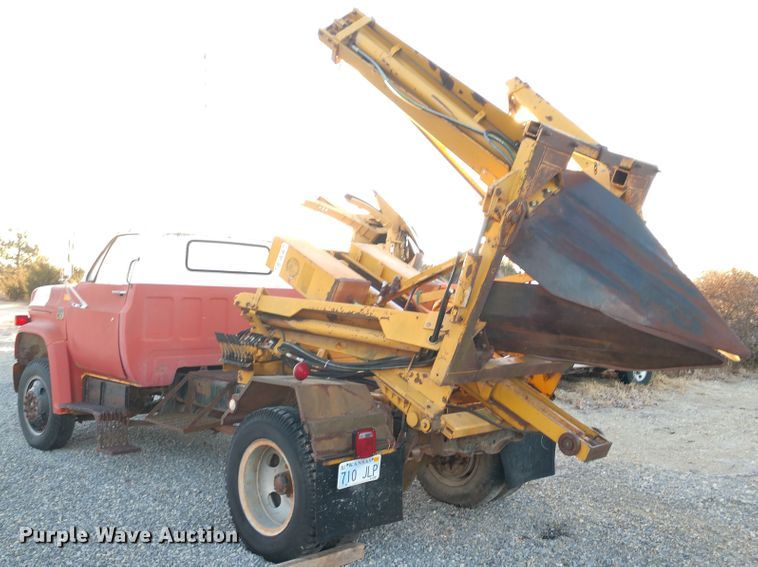 image for item DE6867 1977 Chevrolet C60 truck with Vermeer tree spade