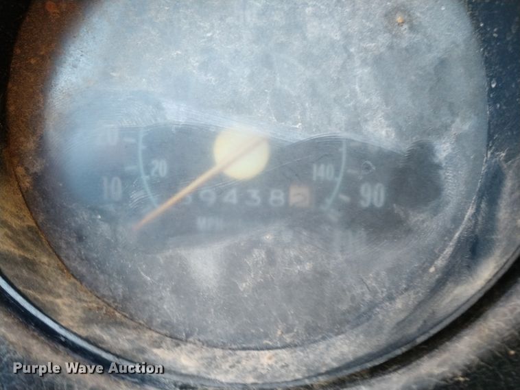 image for item DE6867 1977 Chevrolet C60 truck with Vermeer tree spade