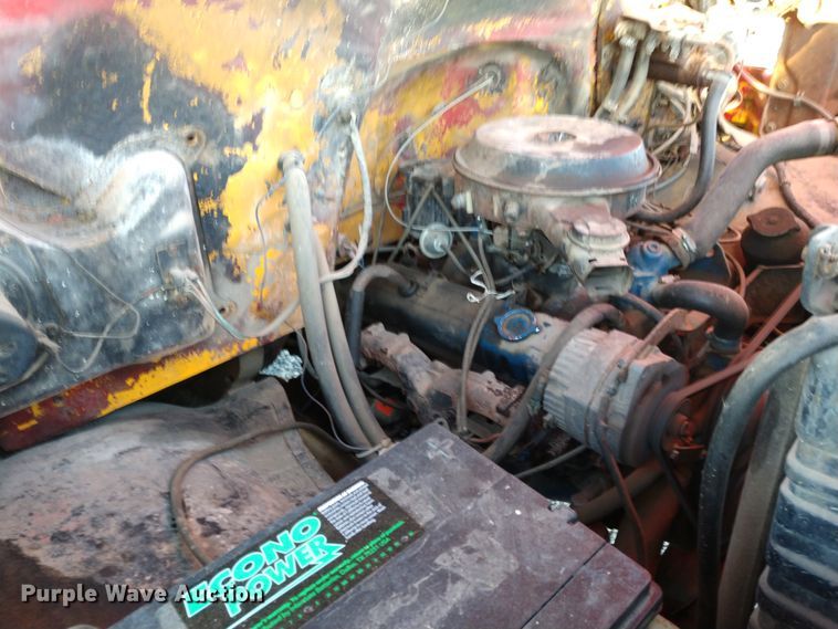 image for item DE6867 1977 Chevrolet C60 truck with Vermeer tree spade