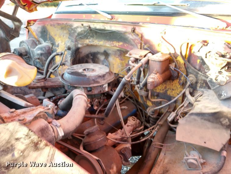 image for item DE6867 1977 Chevrolet C60 truck with Vermeer tree spade