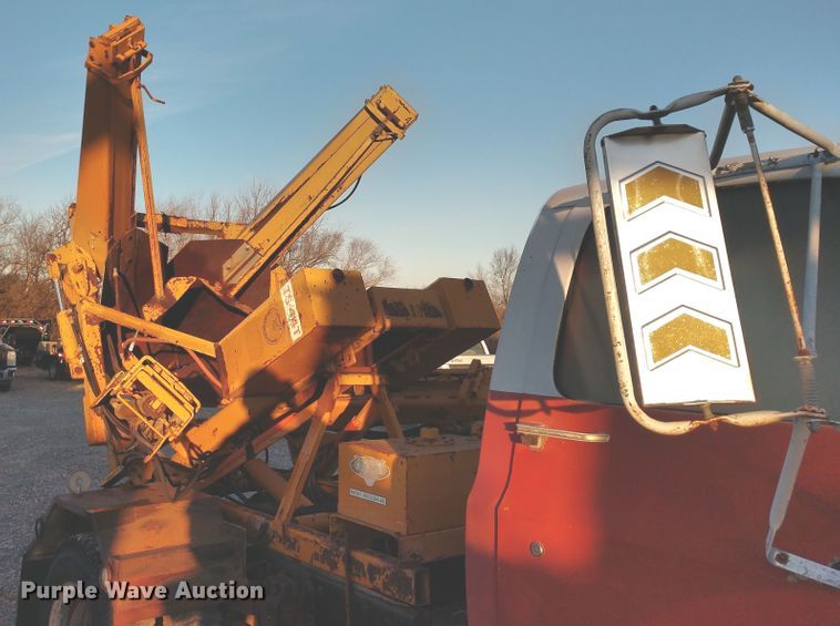 image for item DE6867 1977 Chevrolet C60 truck with Vermeer tree spade