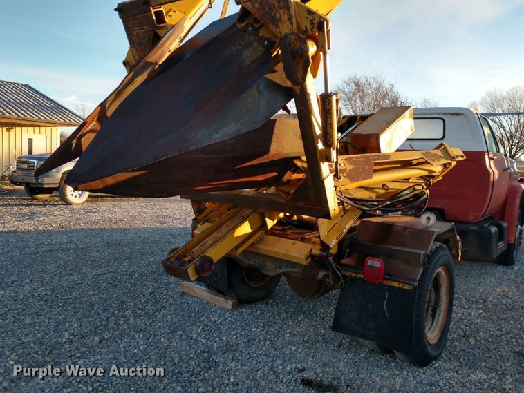 image for item DE6867 1977 Chevrolet C60 truck with Vermeer tree spade