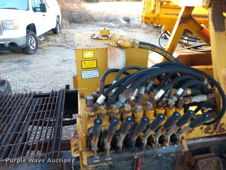 image for item DE6867 1977 Chevrolet C60 truck with Vermeer tree spade