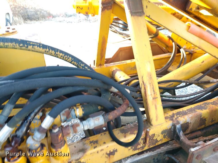 image for item DE6867 1977 Chevrolet C60 truck with Vermeer tree spade