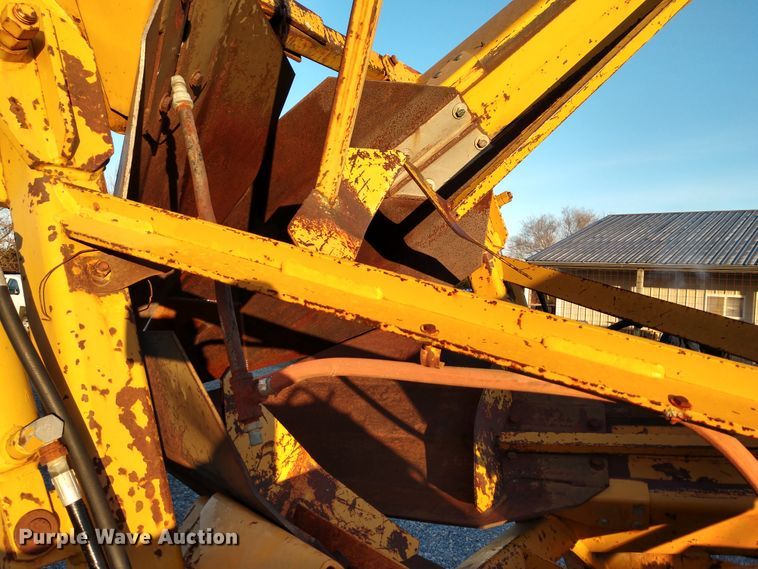 image for item DE6867 1977 Chevrolet C60 truck with Vermeer tree spade