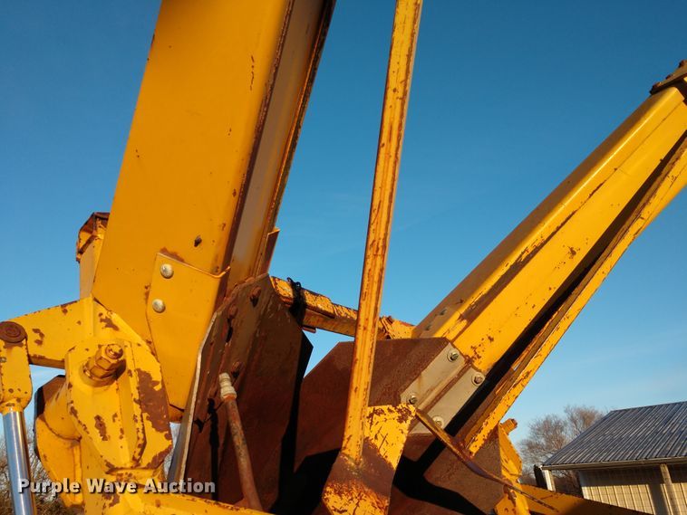 image for item DE6867 1977 Chevrolet C60 truck with Vermeer tree spade