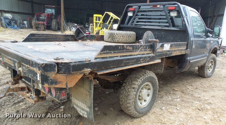 image for item DG5531 2000 Ford F350 Super Duty XLT bale bed pickup truck