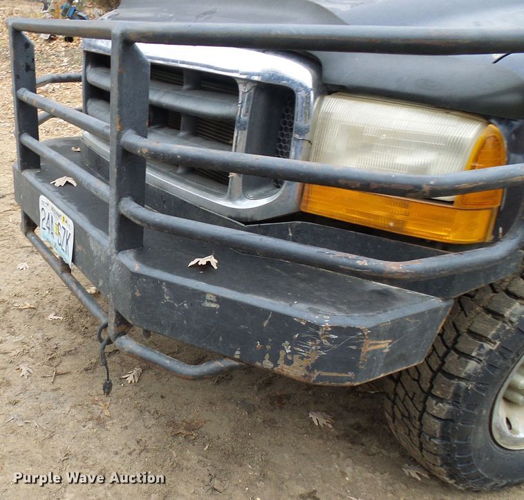 image for item DG5531 2000 Ford F350 Super Duty XLT bale bed pickup truck