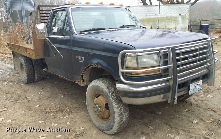 image for item DG5532 1995 Ford F350 XLT flatbed pickup truck
