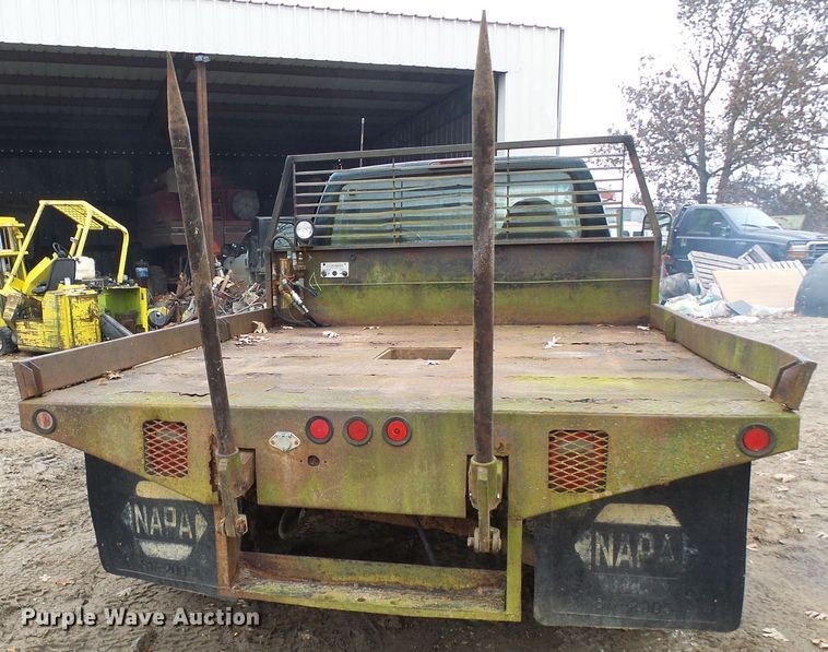 image for item DG5532 1995 Ford F350 XLT flatbed pickup truck