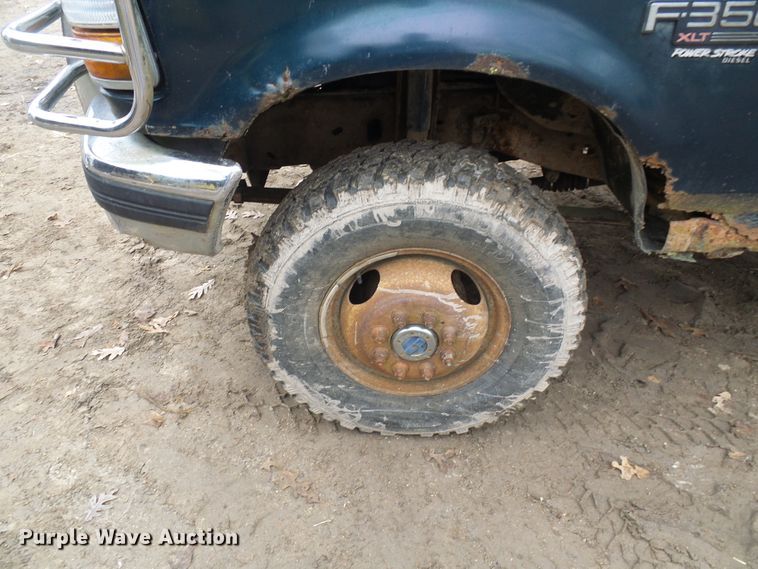 image for item DG5532 1995 Ford F350 XLT flatbed pickup truck