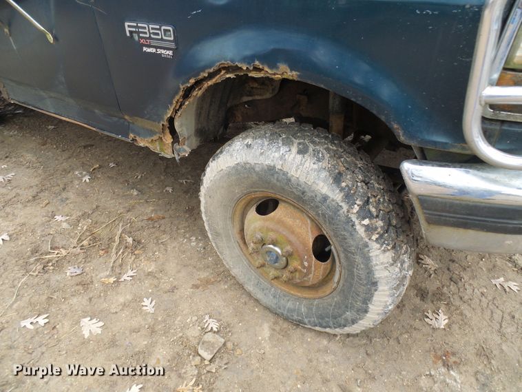 image for item DG5532 1995 Ford F350 XLT flatbed pickup truck