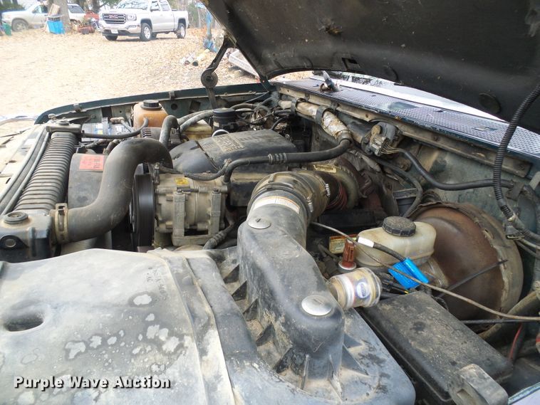 image for item DG5532 1995 Ford F350 XLT flatbed pickup truck