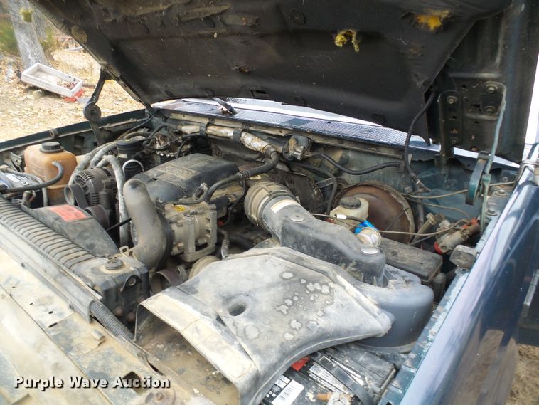 image for item DG5532 1995 Ford F350 XLT flatbed pickup truck