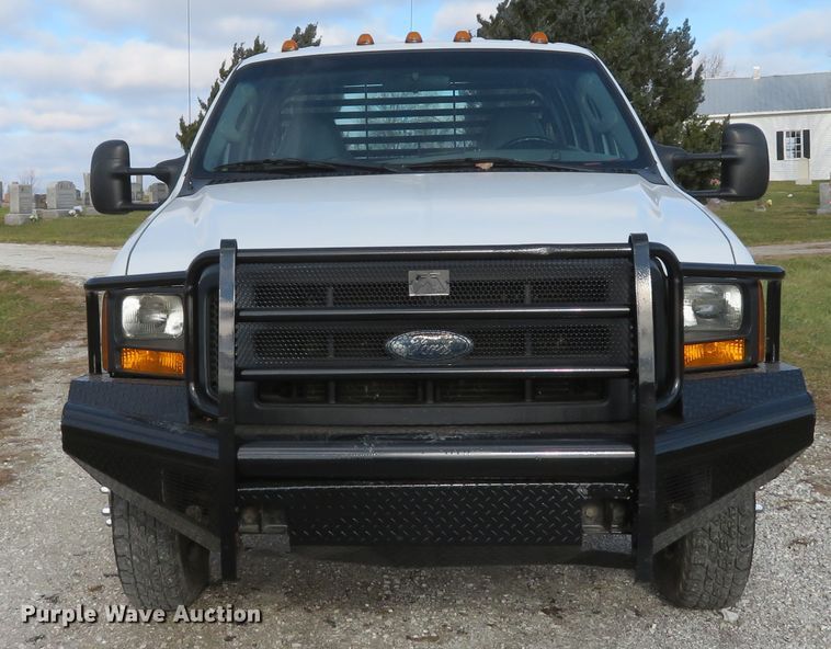 image for item DH1703 2006 Ford F350 Super Duty XL Crew Cab flatbed pickup truck