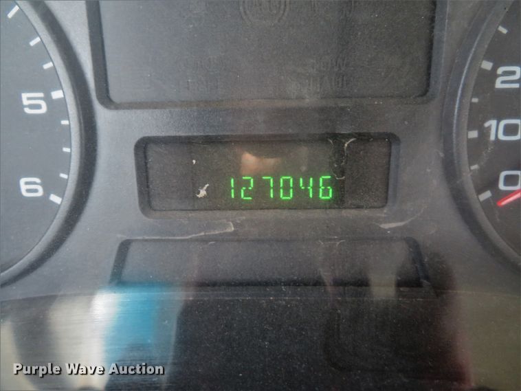 image for item DH1703 2006 Ford F350 Super Duty XL Crew Cab flatbed pickup truck