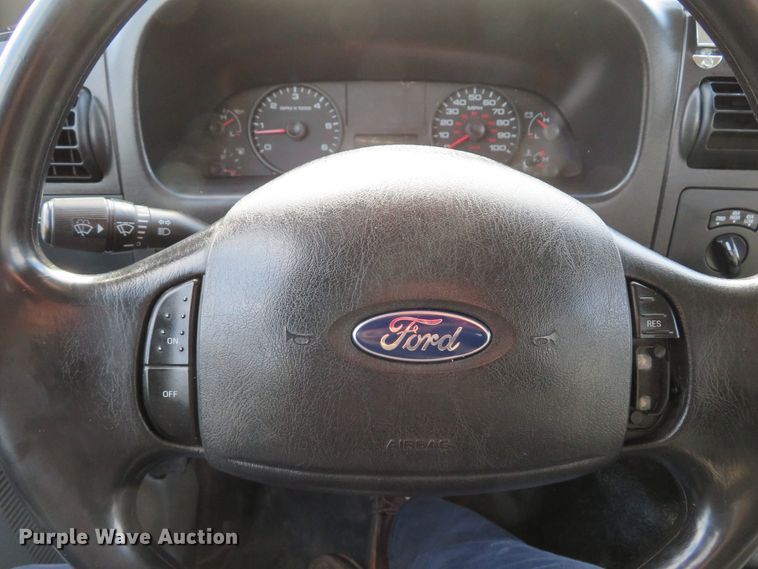 image for item DH1703 2006 Ford F350 Super Duty XL Crew Cab flatbed pickup truck