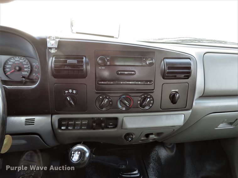 image for item DH1703 2006 Ford F350 Super Duty XL Crew Cab flatbed pickup truck