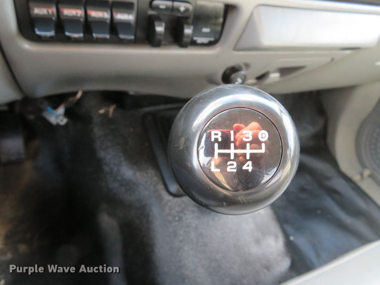 image for item DH1703 2006 Ford F350 Super Duty XL Crew Cab flatbed pickup truck