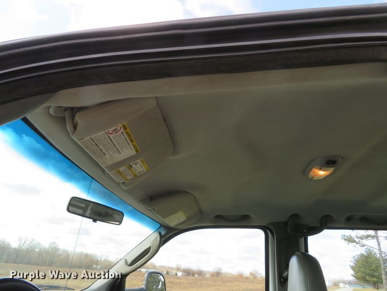 image for item DH1703 2006 Ford F350 Super Duty XL Crew Cab flatbed pickup truck