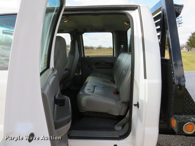 image for item DH1703 2006 Ford F350 Super Duty XL Crew Cab flatbed pickup truck