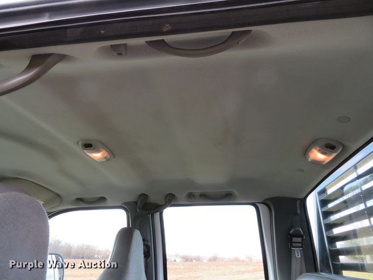 image for item DH1703 2006 Ford F350 Super Duty XL Crew Cab flatbed pickup truck