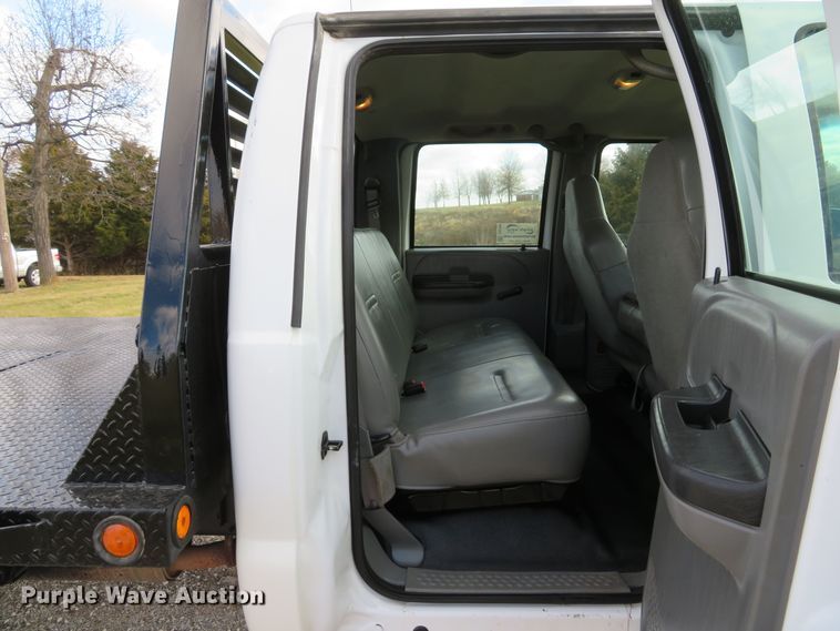 image for item DH1703 2006 Ford F350 Super Duty XL Crew Cab flatbed pickup truck