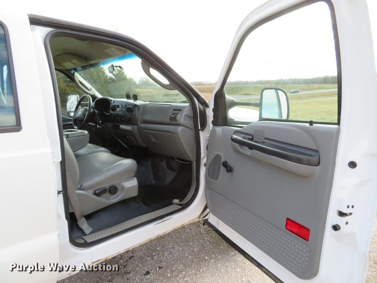 image for item DH1703 2006 Ford F350 Super Duty XL Crew Cab flatbed pickup truck