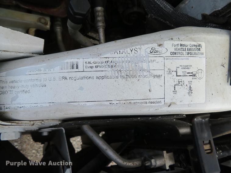 image for item DH1703 2006 Ford F350 Super Duty XL Crew Cab flatbed pickup truck