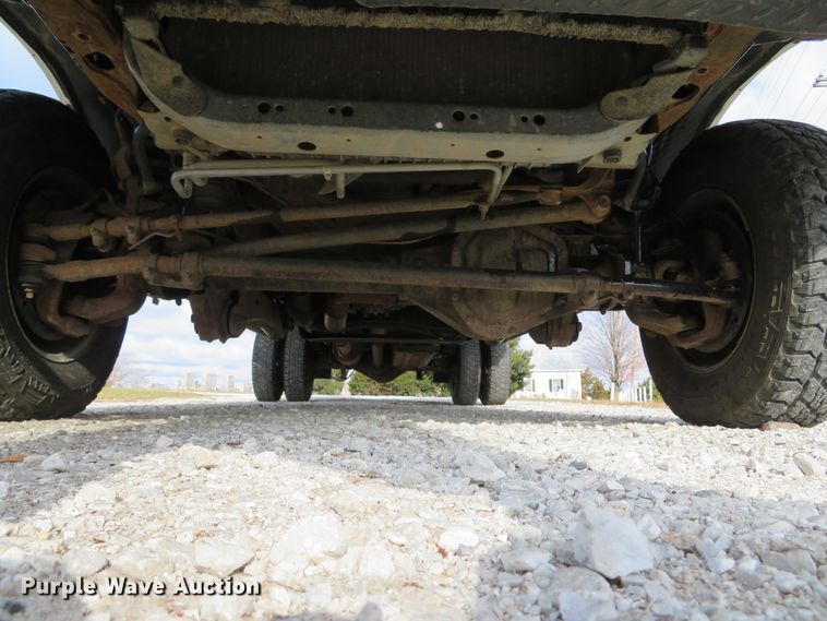 image for item DH1703 2006 Ford F350 Super Duty XL Crew Cab flatbed pickup truck