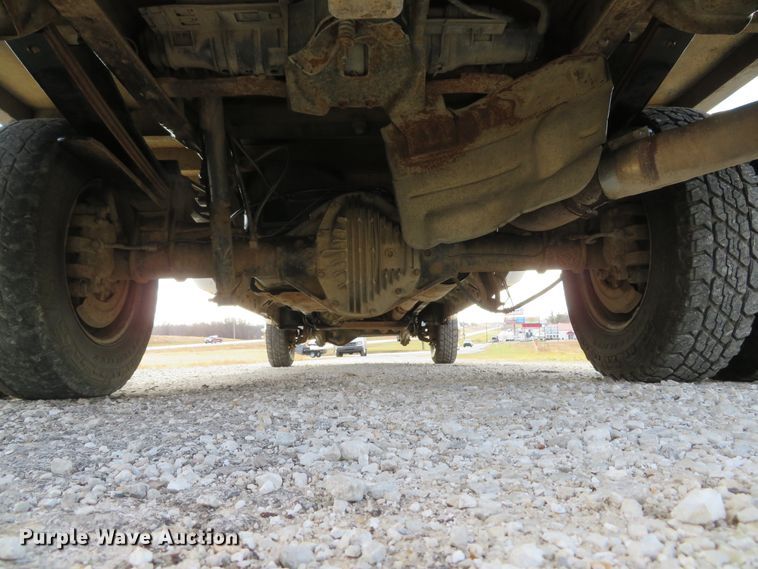 image for item DH1703 2006 Ford F350 Super Duty XL Crew Cab flatbed pickup truck